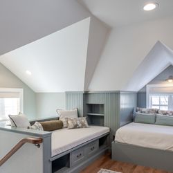 This whole-home renovation blends traditional character, custom cabinetry, tailored furnishings, and modern comfort for family gatherings.