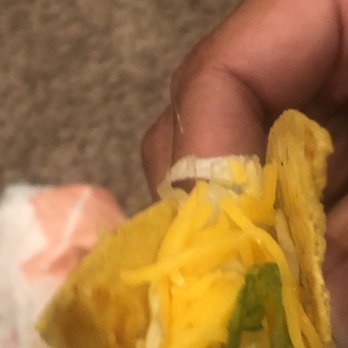 Taco Bell - Hairs on the top coming out... when opened it was a whole chunk clumped together. - Fast Food Near Me - Riverside, California
