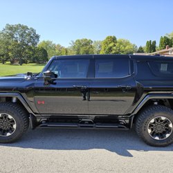 Ultra Auto Enhancement - Window Tinting SUV -  New Hummer, tinting the front windows to match the backs.