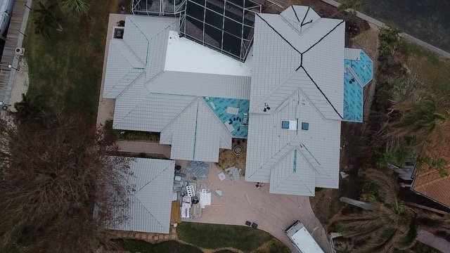 Slide of Beaver Roofing