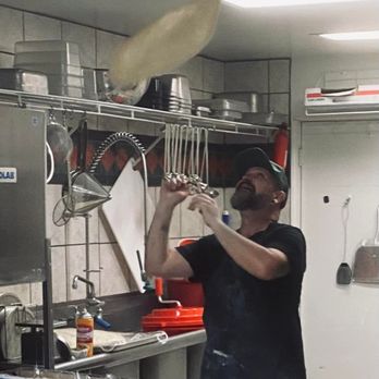 Dark Sky Pie Pizza - Chef Jeffrey Perce makes hand-tossing a pizza look quite easy. - Pizza Near Me - Norwood, Colorado Dark Sky Pie Pizza - Chef Jeffrey Perce makes hand-tossing a pizza look quite easy. - Pizza Near Me - Norwood, Colorado
