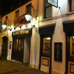 JD Wetherspoon - Night time view of the spirit merchant , friendly and busy community pub