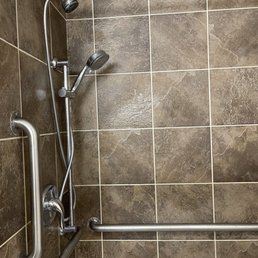 ADA shower that is definitely not ADA compliant - valve is 6" off the floor. ADA shower that is definitely not ADA compliant - valve is 6" off the floor.