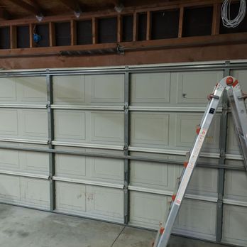 Rapid Repair Garage Doors - Old double door, really heavy and noisy to open manually. - Garage Door Services Near Me - Temecula, California