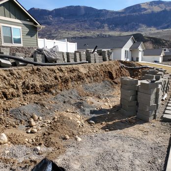 Moongate Landscaping & Construction - the construction of a retaining wall - Irrigation Near Me Moongate Landscaping & Construction - the construction of a retaining wall - Irrigation Near Me