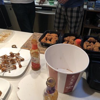 KFC - a table full of food and condiments - Chicken Wings Near Me - Kelowna, British Columbia KFC - a table full of food and condiments - Chicken Wings Near Me - Kelowna, British Columbia