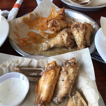Hooters - Forgot to take a before picture of our wings - Sports Bars Near Me - Stafford, Texas Hooters - Forgot to take a before picture of our wings - Sports Bars Near Me - Stafford, Texas