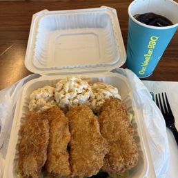 Island white fish substitute Mac for rice and veggies underneath. Flaky and hot.  Was really good