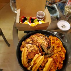Boricua Soul - Coquito French toast, pimento cheese deviled eggs, sweet plantain chicken and waffles, cheese hash brown waffles, sausage and mixed fruit.