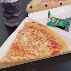 Road Ranger - Two slices of sausage for 6 bucks Kraft parmesan cheese the good stuff and a zero sugar grape Powerade ice cold.