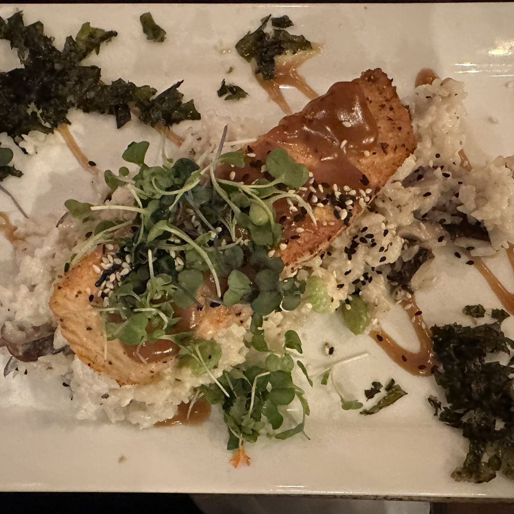 Scratch Kitchen & Taproom - Sesame Salmon entrée (pan-seared salmon over a mushroom and edamame sticky rice risotto, garnished with mirin-soy glaze), Oct 2024. - Bars Near Me - Apex, North Carolina Scratch Kitchen & Taproom - Sesame Salmon entrée (pan-seared salmon over a mushroom and edamame sticky rice risotto, garnished with mirin-soy glaze), Oct 2024. - Bars Near Me - Apex, North Carolina