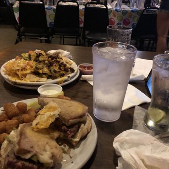 Charlies Bar & Grille - Nachos and Charlie's choice with tots. - Bars Near Me - Grand Rapids, Michigan