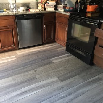 Custom Blind & Carpet - Kitchen with new vinyl. May look like a different color than the other room but it's not. - Shades & Blinds Near Me - Tarzana, California