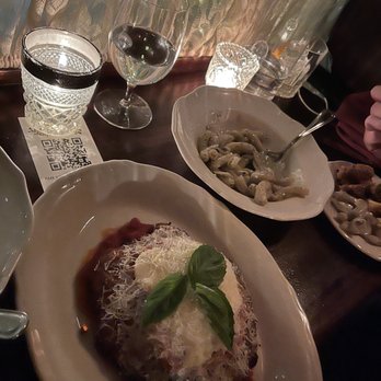 Ciccio Mio - Chicken Parm and truffle pasta in the back - Italian Near Me - Chicago, Illinois Ciccio Mio - Chicken Parm and truffle pasta in the back - Italian Near Me - Chicago, Illinois