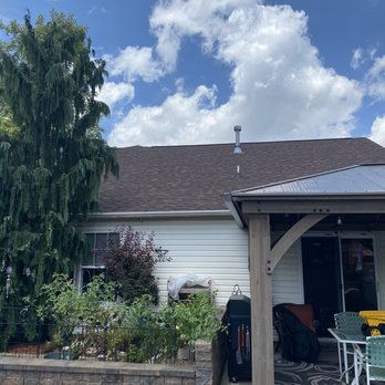 USA Roofing Systems & Exteriors - a house with a covered patio - Roofing Near Me USA Roofing Systems & Exteriors - a house with a covered patio - Roofing Near Me