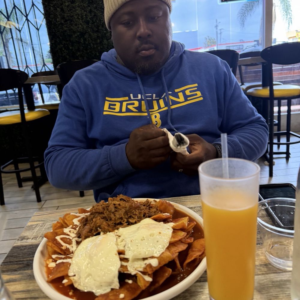 A Huevo Cafe - He enjoyed his birria chilaquiles. They were massive. - Breakfast & Brunch Near Me - Los Angeles, California A Huevo Cafe - He enjoyed his birria chilaquiles. They were massive. - Breakfast & Brunch Near Me - Los Angeles, California