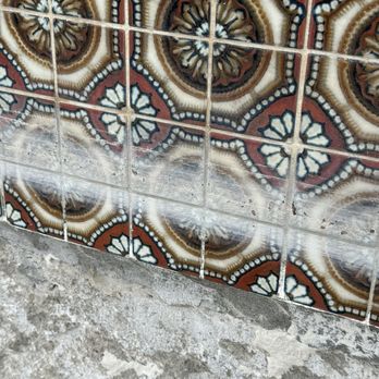 Precision Pool Tile Cleaning - Before - ugly calcium buildup along water line - Pool Cleaners Near Me - Eastvale, California Precision Pool Tile Cleaning - Before - ugly calcium buildup along water line - Pool Cleaners Near Me - Eastvale, California