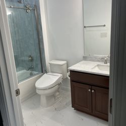 Lake Norman Stone and Tile - New wall and floor tile, countertop, and shower glass.