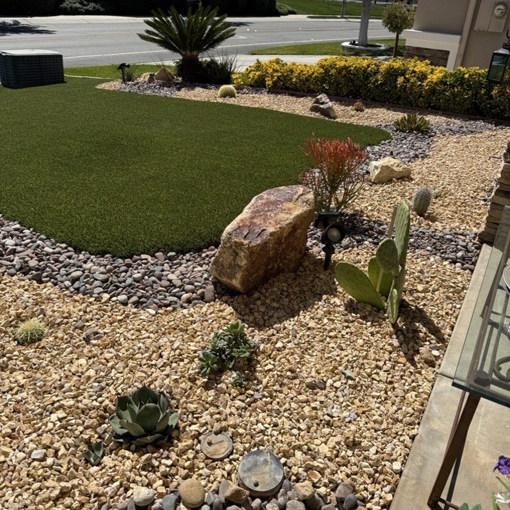 Monarch Landscape And Design - Front yard with artificial turf and a desert landscape border. - Landscape Architects or Designers Near Me - Hesperia, California Monarch Landscape And Design - Front yard with artificial turf and a desert landscape border. - Landscape Architects or Designers Near Me - Hesperia, California