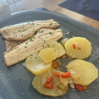 Port Vela - Sea bass with potatoes - Tapas Bars Near Me - Barcelona, B Port Vela - Sea bass with potatoes - Tapas Bars Near Me - Barcelona, B