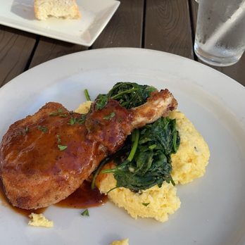 Bella Siena - Pecan Crusted Pork Chop w/ sautéed spinach and creamy polenta - Italian Near Me - Benicia, California Bella Siena - Pecan Crusted Pork Chop w/ sautéed spinach and creamy polenta - Italian Near Me - Benicia, California