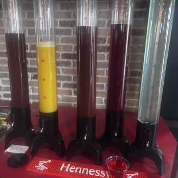 Reunion Restaurant - The self serve drink mixers.  There'e spicy or regular bloody mix, orange juice, cranberry juice and lemonade. - Arcades Near Me - West Allis, Wisconsin