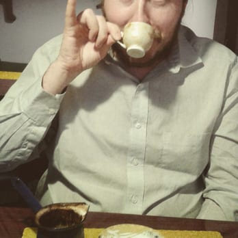 Habibi  - My husband enjoying the delicious Turkish coffee. - Mediterranean Near Me - Erie, Pennsylvania