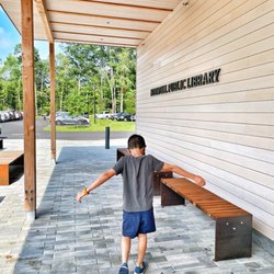 Norwell Public Library - Covered entranceway with benches