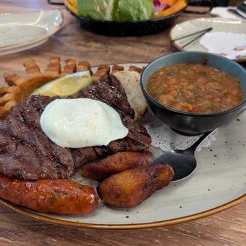 Aguardiente - Bandeja Paisa Con Entrana - Steakhouses Near Me - Orlando, Florida
