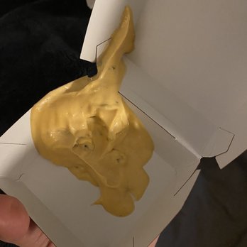 McDonald's - a person holding a box of mustard - Fast Food Near Me - Oklahoma City, Oklahoma McDonald's - a person holding a box of mustard - Fast Food Near Me - Oklahoma City, Oklahoma