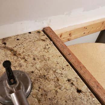 Rocksolid Surfaces - Chipped corner near wall - Building Supplies Near Me - Cleveland, Ohio