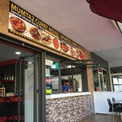 Mumtaz Curry House - Front entrance and takeaway window.