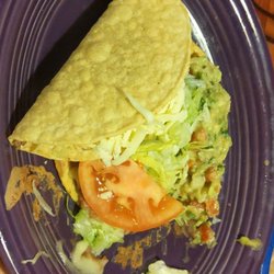 Plate two of the fiesta dinner hard taco and chalupa