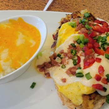 Another Broken Egg Cafe - Crab cake benedict. Grits were bland and stiff. - Breakfast & Brunch Near Me - Dunwoody, Georgia