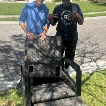 Backyard Retreats - Byron and Ricardo, having taken the new recliner inside and standing behind the old one they took to the street for us. - Outdoor Furniture Stores Near Me - Mount Pleasant, South Carolina
