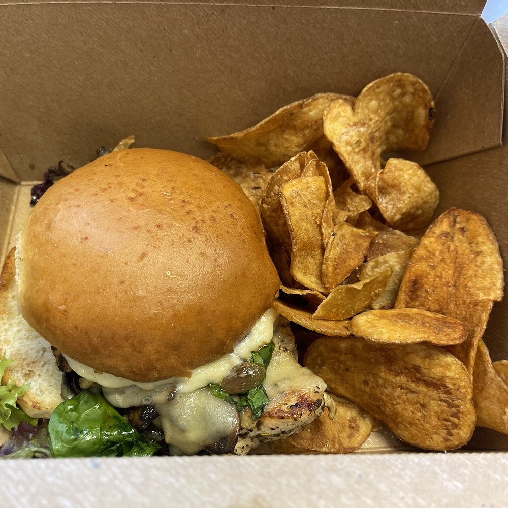 Fest Biergarten - Grilled chicken sandwich with homemade chips - Beer Gardens Near Me - Midlothian, Virginia Fest Biergarten - Grilled chicken sandwich with homemade chips - Beer Gardens Near Me - Midlothian, Virginia