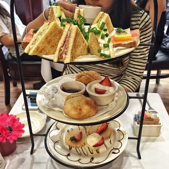 Chado Tea Room - Three tier rack serving: sandwiches on top, scones on the second level, and pastries on the third - Tea Rooms Near Me - Hollywood, California Chado Tea Room - Three tier rack serving: sandwiches on top, scones on the second level, and pastries on the third - Tea Rooms Near Me - Hollywood, California
