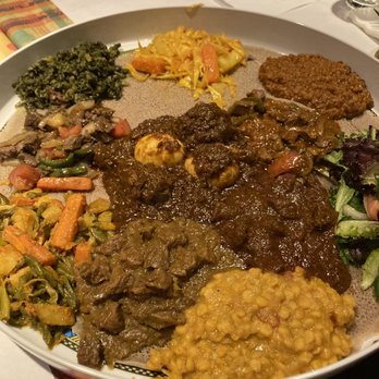 Enjera Restaurant - Meat Lovers Combo for two + Veggie Combo for one, more than enough for four people! - Ethiopian Near Me - Arlington, Virginia