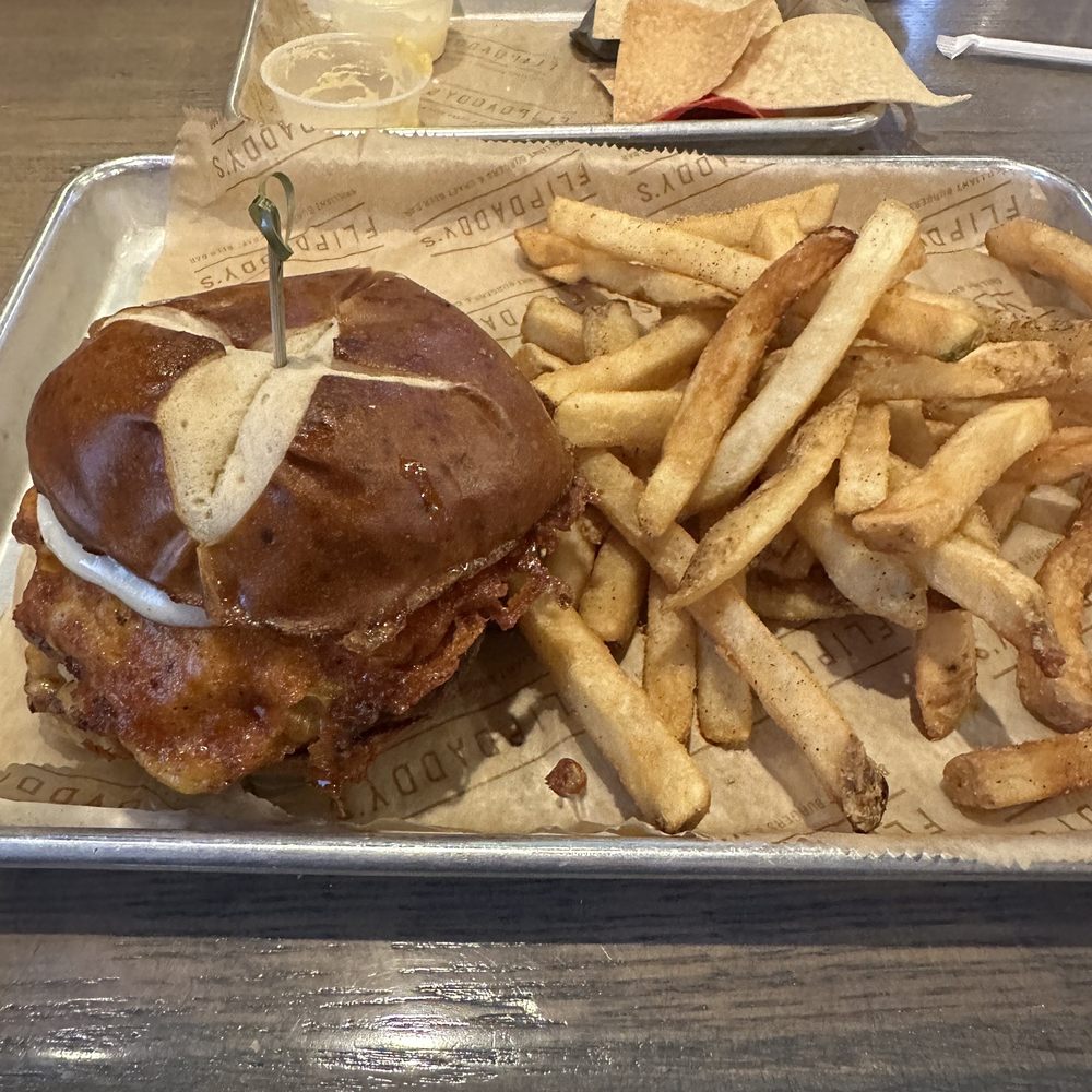 Mac Daddy burger with fries Mac Daddy burger with fries