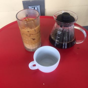 Hopscotch Coffee - Iced coffee and a pour over - Coffee Roasteries Near Me - Bloomington, Indiana