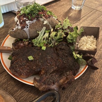 Old Place - 18oz Ribeye with salad and loaded baked potato - American Near Me - Cornell, California Old Place - 18oz Ribeye with salad and loaded baked potato - American Near Me - Cornell, California