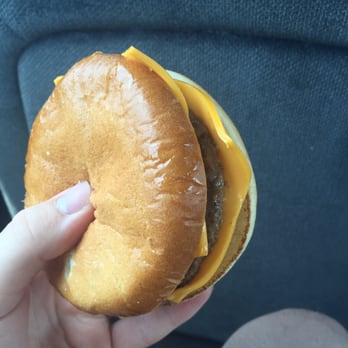 McDonald's - a hand holding a cheeseburger - Fast Food Near Me - Wadesboro, North Carolina McDonald's - a hand holding a cheeseburger - Fast Food Near Me - Wadesboro, North Carolina