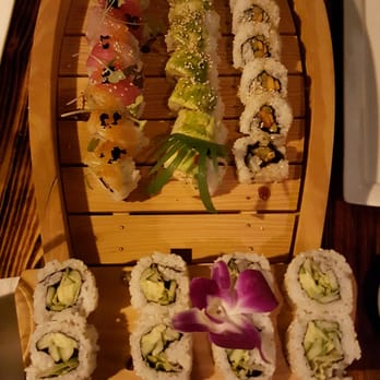 Oceano Sushi - Like how they put all our orders on one boat. Really saves table space. - Sushi Bars Near Me - Bothell, Washington
