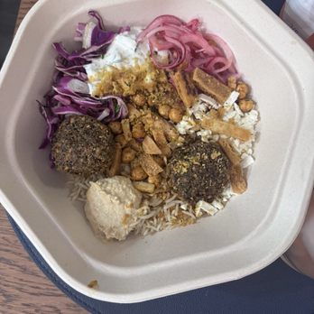 Mezeh - What's in this bowl? Not very much. TWO falafels? - Middle Eastern Near Me - Bridgeville, Pennsylvania Mezeh - What's in this bowl? Not very much. TWO falafels? - Middle Eastern Near Me - Bridgeville, Pennsylvania