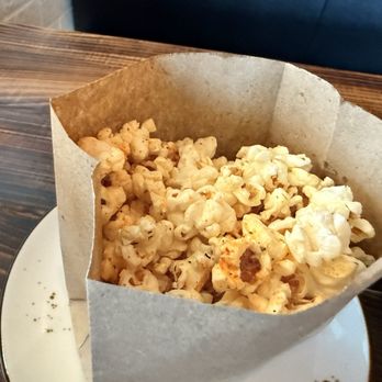 Stillwaters Tavern - Land O' Lakes - Season popcorn brought to the table - Wine Bars Near Me - Land O' Lakes, Florida Stillwaters Tavern - Land O' Lakes - Season popcorn brought to the table - Wine Bars Near Me - Land O' Lakes, Florida
