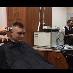 Mike's Classic Barbershop - Hard at work on a high and tight.
