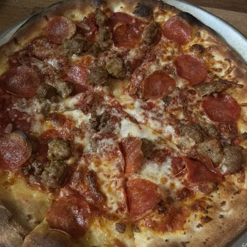 Yard House - Pizza with the meats. My son is pretty picky about his pizza but he enjoyed this! Good amount of char and the crust had a nice texture! - New American Near Me - Honolulu, Hawaii Yard House - Pizza with the meats. My son is pretty picky about his pizza but he enjoyed this! Good amount of char and the crust had a nice texture! - New American Near Me - Honolulu, Hawaii
