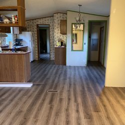 Monk's Flooring & Construction - Living room and kitchen after installed