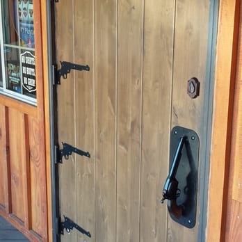 Old Mill Saloon - The front door with gun handle and gun hinges! - Breakfast & Brunch Near Me - Estacada, Oregon Old Mill Saloon - The front door with gun handle and gun hinges! - Breakfast & Brunch Near Me - Estacada, Oregon