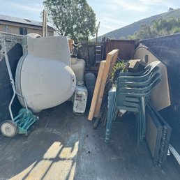 My junk piled in Manny's trailer My junk piled in Manny's trailer